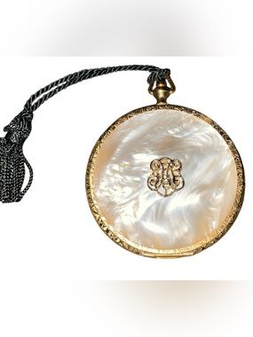 Early 1960s Estee Lauder Watch Fob Style Powder Compact in Color Sun Burnt